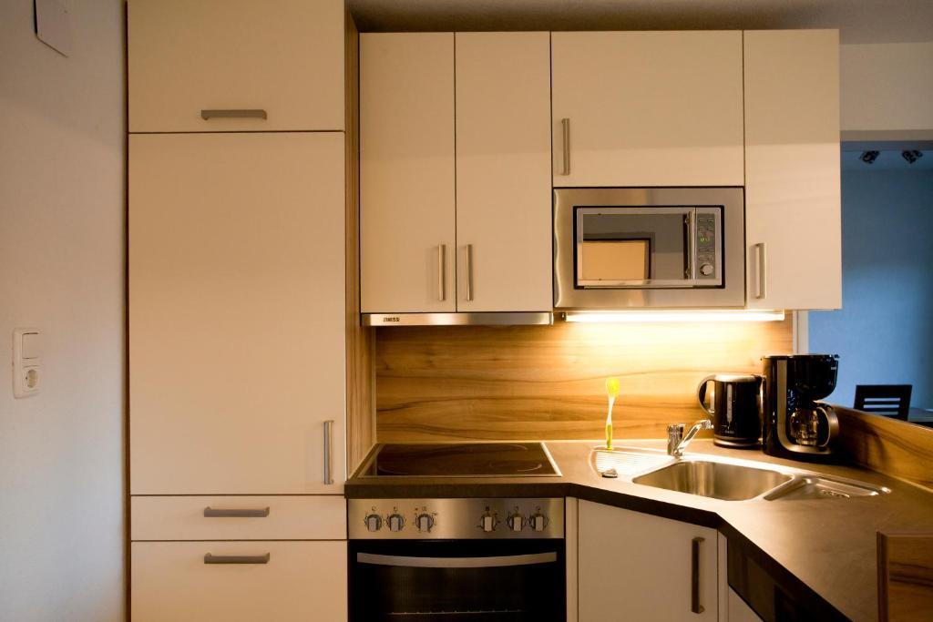 Alpenhof Waengle Aparthotel รอยท์เทอ ภายนอก รูปภาพ
